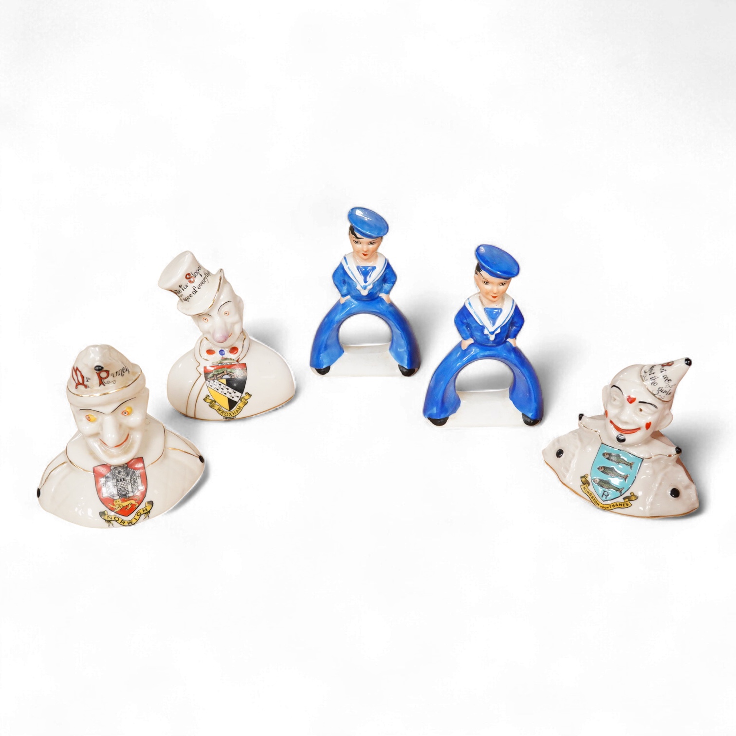 A pair of Art Deco Carltonware ‘sailor napkin rings’ and two Cartlon china crested clowns